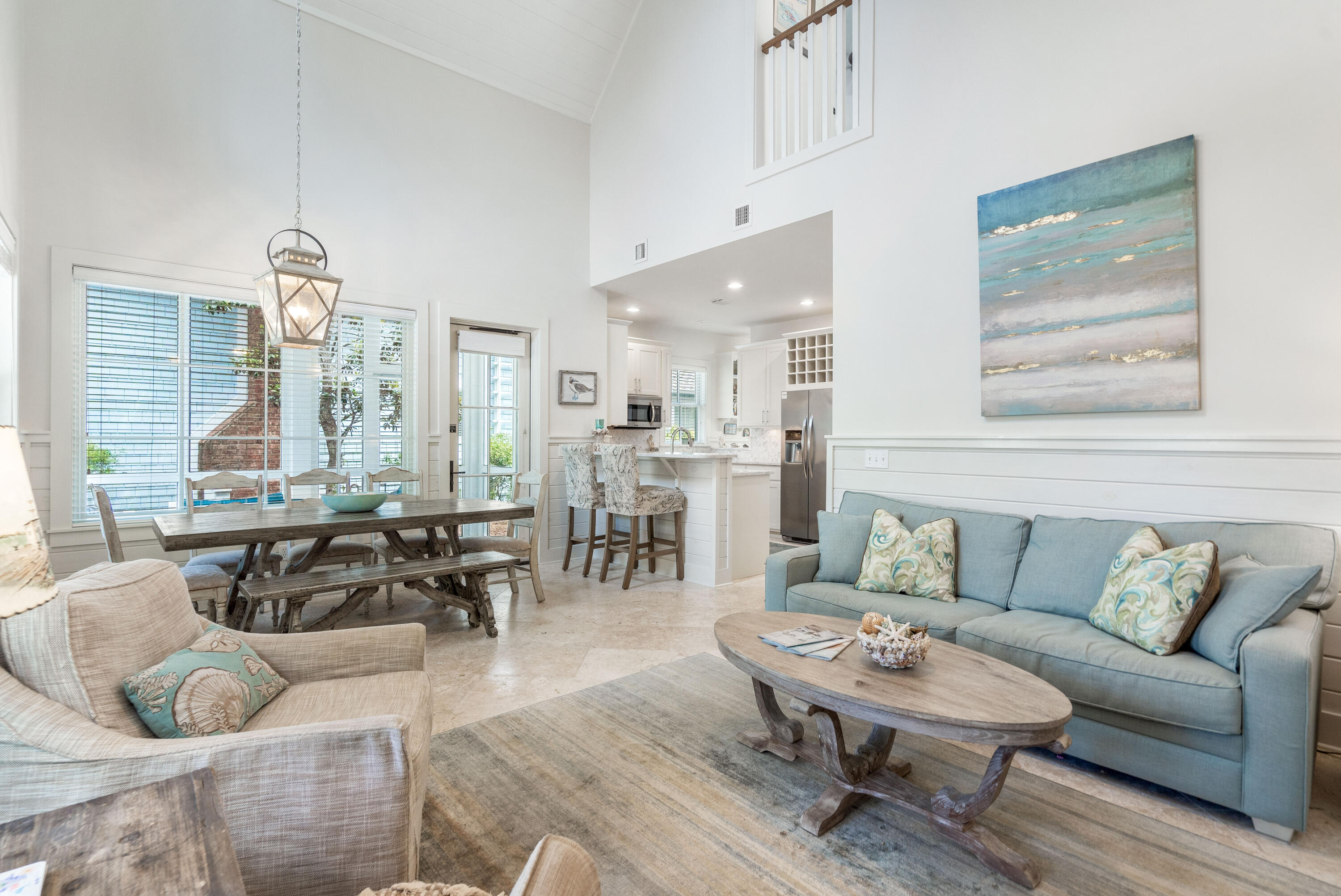 247 Salt Lane Watersound, FL 32461 - Photo 13 of 45 a living room with furniture and a large window