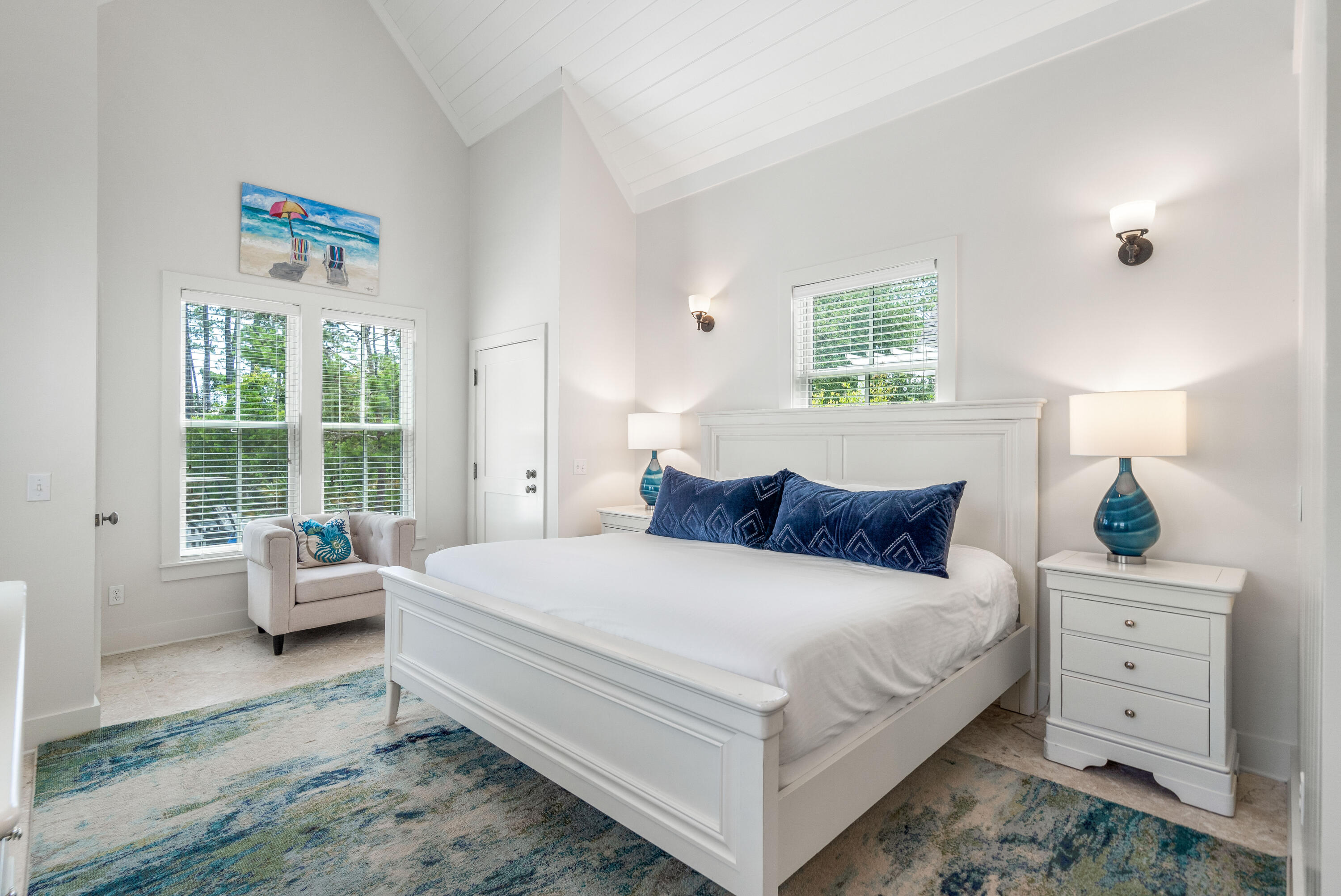 247 Salt Lane Watersound, FL 32461 - Photo 20 of 45 a bedroom with a large bed and a window