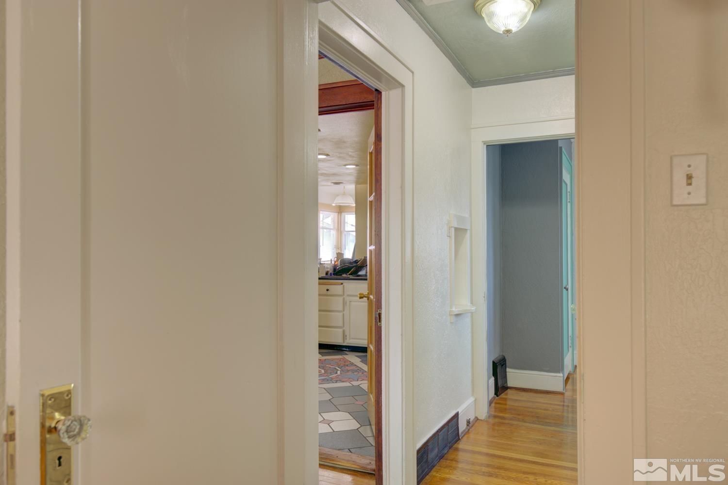 321 Crampton Street, Unit 1/2 Reno, NV 89502 - Photo 18 of 40 a view of a hallway with wooden floor and closet area