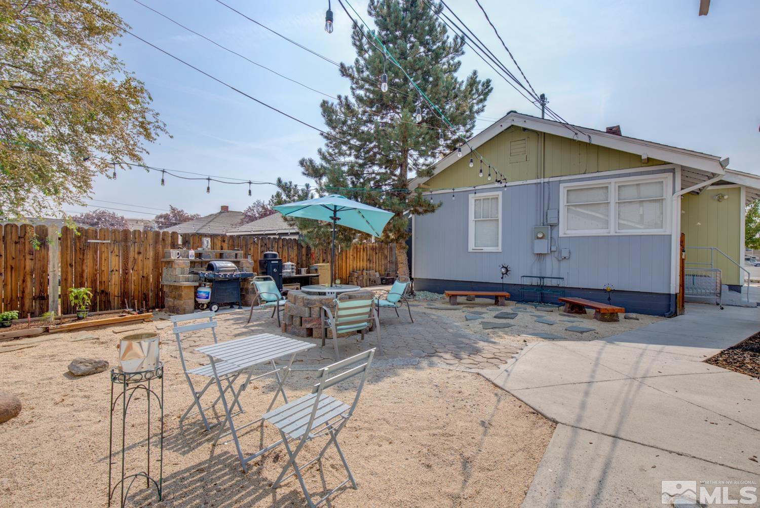 321 Crampton Street, Unit 1/2 Reno, NV 89502 - Photo 21 of 40 a view of house with yard and sitting area
