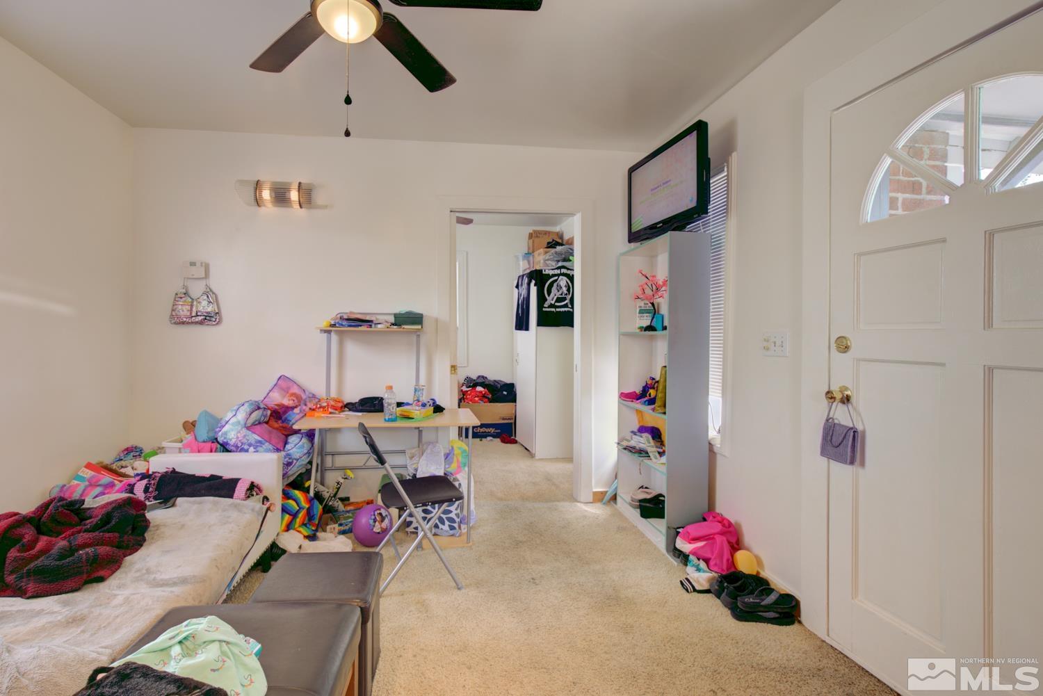 321 Crampton Street, Unit 1/2 Reno, NV 89502 - Photo 25 of 40 a view of a kids room with toys