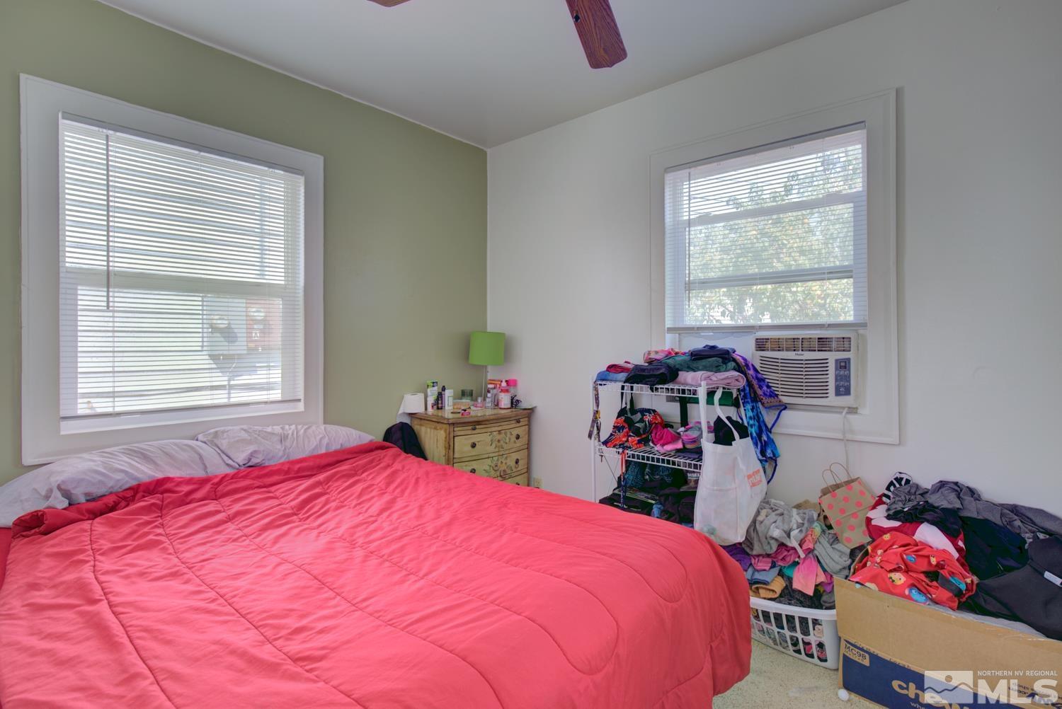 321 Crampton Street, Unit 1/2 Reno, NV 89502 - Photo 26 of 40 a bedroom with a bed and a window