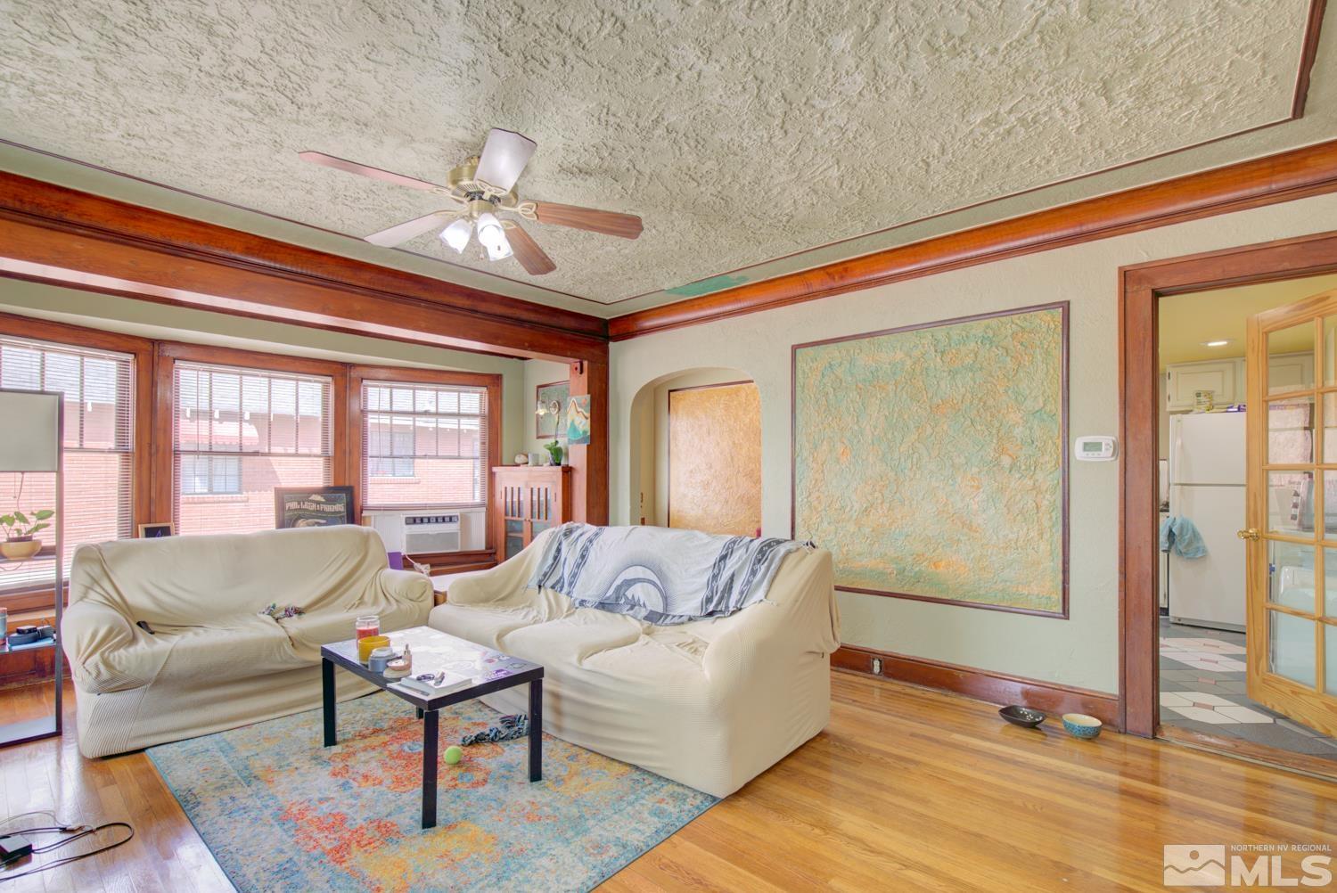 321 Crampton Street, Unit 1/2 Reno, NV 89502 - Photo 6 of 40 a living room with furniture and a large window