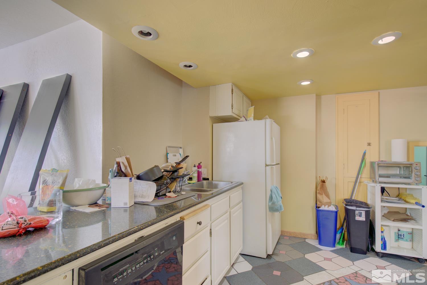321 Crampton Street, Unit 1/2 Reno, NV 89502 - Photo 10 of 40 a kitchen with refrigerator and sink