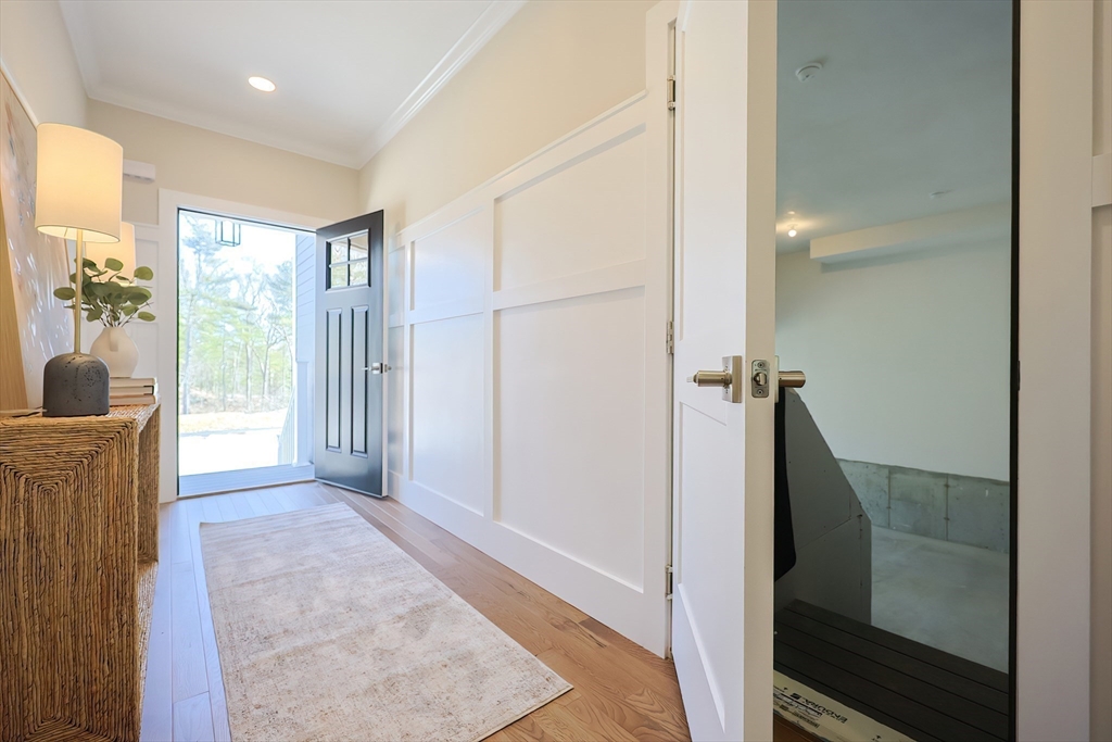 55 Thomas Mann Circle, Unit 32 Norfolk, MA 02056 - Photo 3 of 31 a view of a bathroom with shower