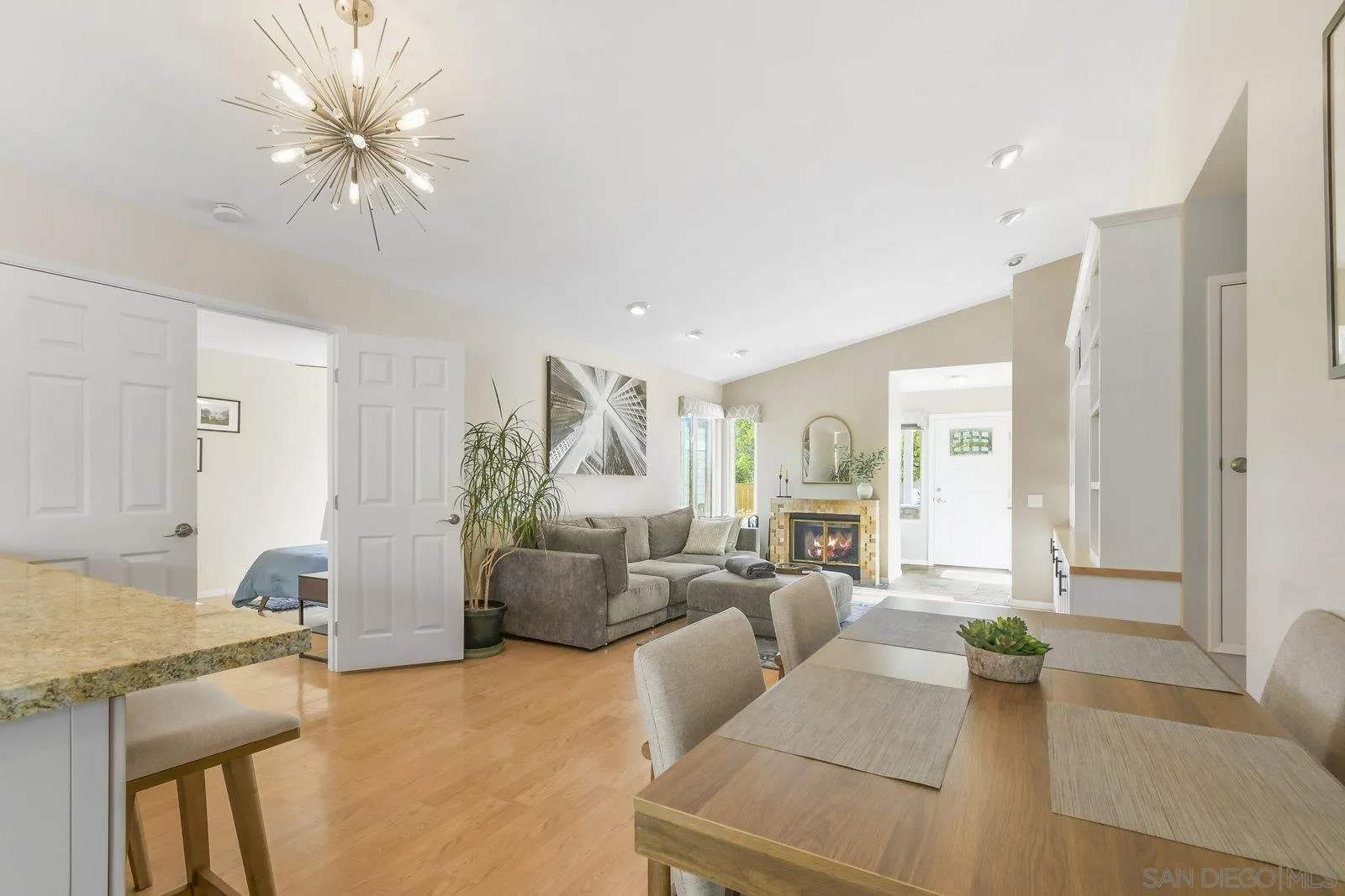 12061 Rue Des Amis San Diego, CA 92131 - Photo 13 of 33 a living room with furniture and large windows