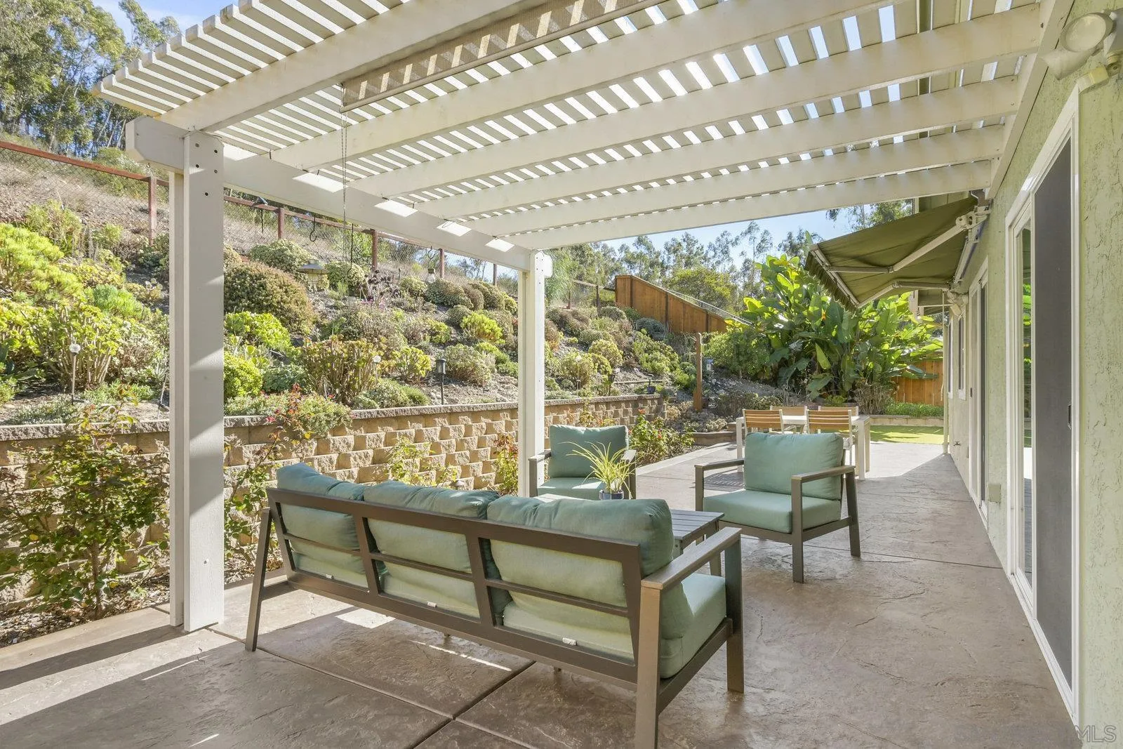 12061 Rue Des Amis San Diego, CA 92131 - Photo 28 of 33 a balcony with furniture and garden view