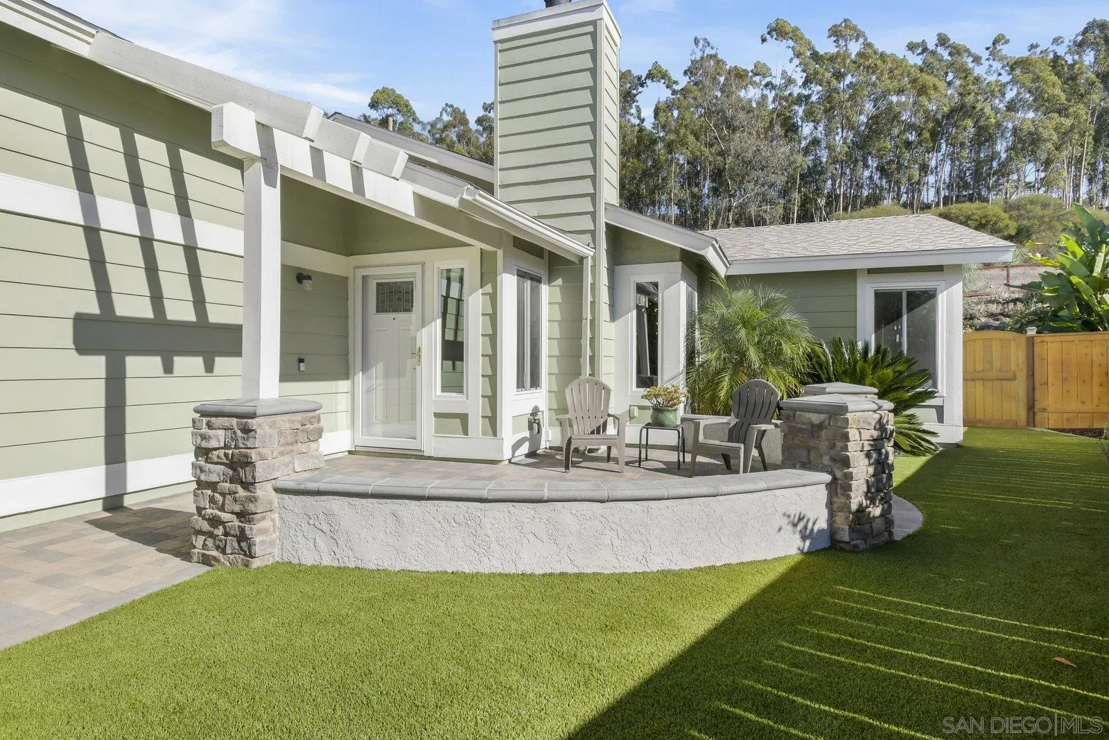 12061 Rue Des Amis San Diego, CA 92131 - Photo 4 of 33 a view of a house with backyard porch and sitting area
