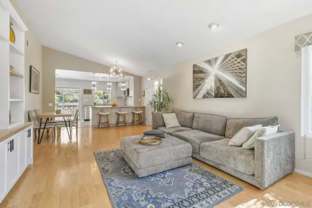 a kitchen with a table and chairs in it