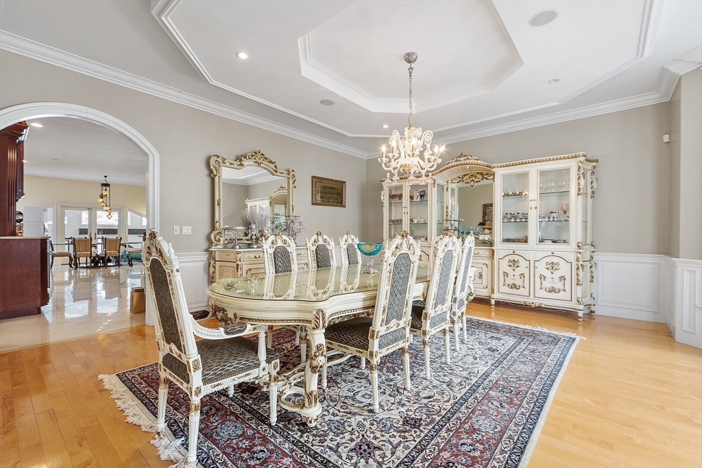 30 Bridle Path Shrewsbury, MA 01545 - Photo 13 of 41 a view of a dining room with furniture and chandelier