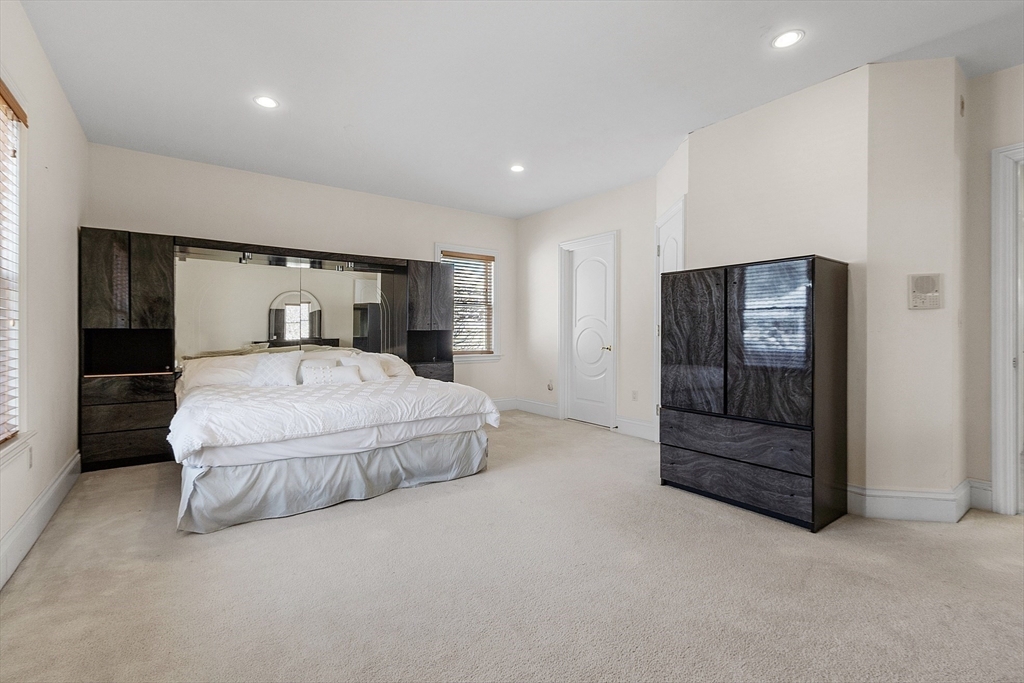 30 Bridle Path Shrewsbury, MA 01545 - Photo 24 of 41 a spacious bedroom with a bed and dresser
