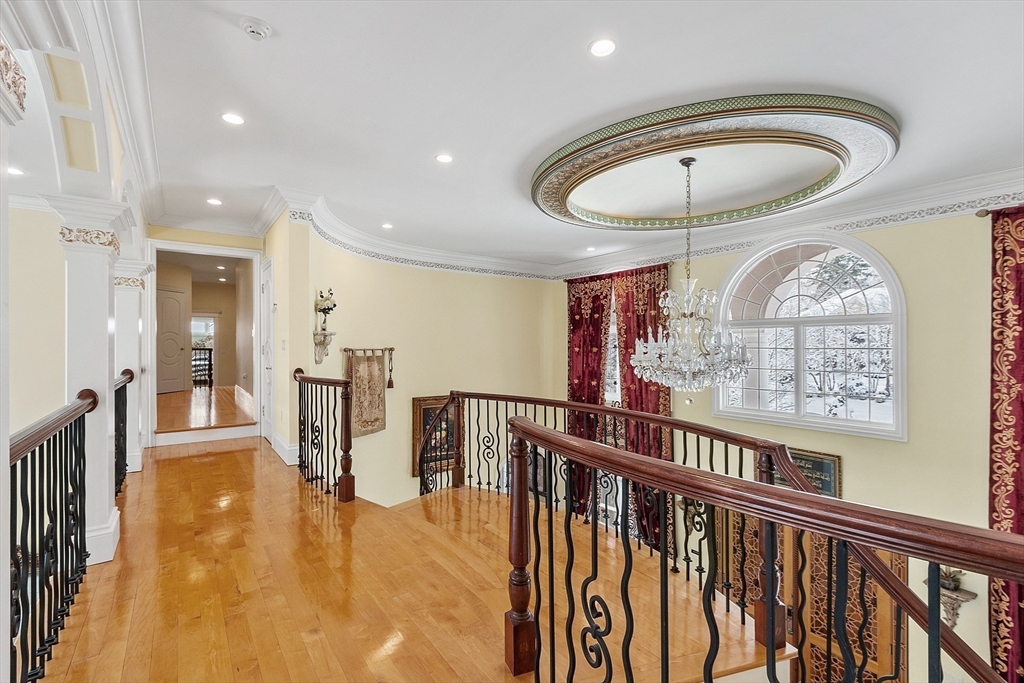 30 Bridle Path Shrewsbury, MA 01545 - Photo 32 of 41 a view of a dining room with furniture wooden floor and chandelier