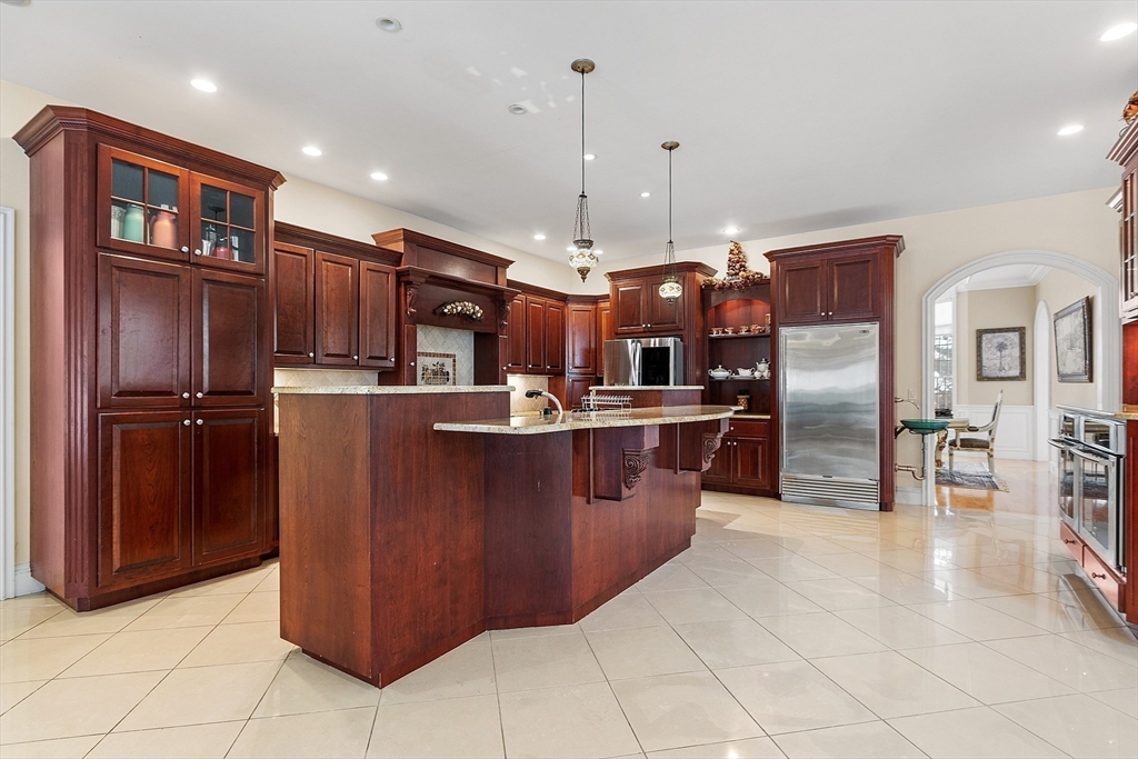 30 Bridle Path Shrewsbury, MA 01545 - Photo 9 of 41 a kitchen with stainless steel appliances granite countertop a refrigerator a oven a sink and a oven