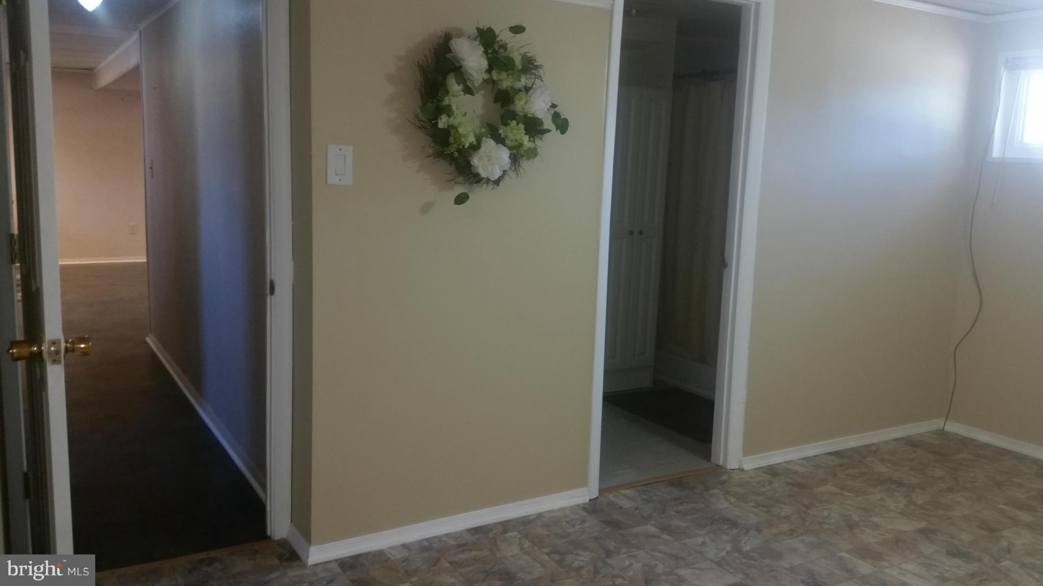 7510 Saffron Court Hanover, MD 21076 - Photo 18 of 30 a view of a hallway with a hallway