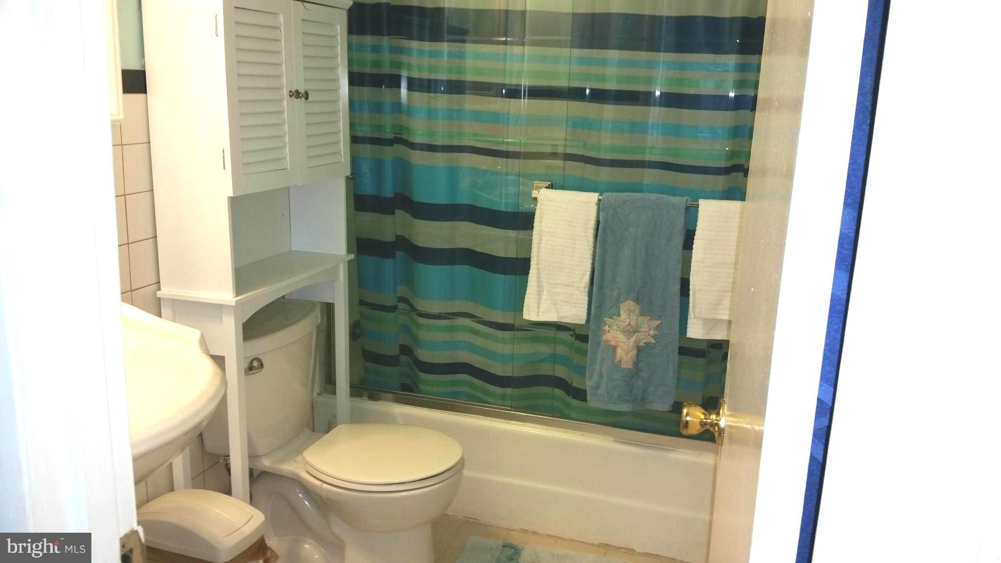 7510 Saffron Court Hanover, MD 21076 - Photo 8 of 30 a bathroom with a toilet and a shower
