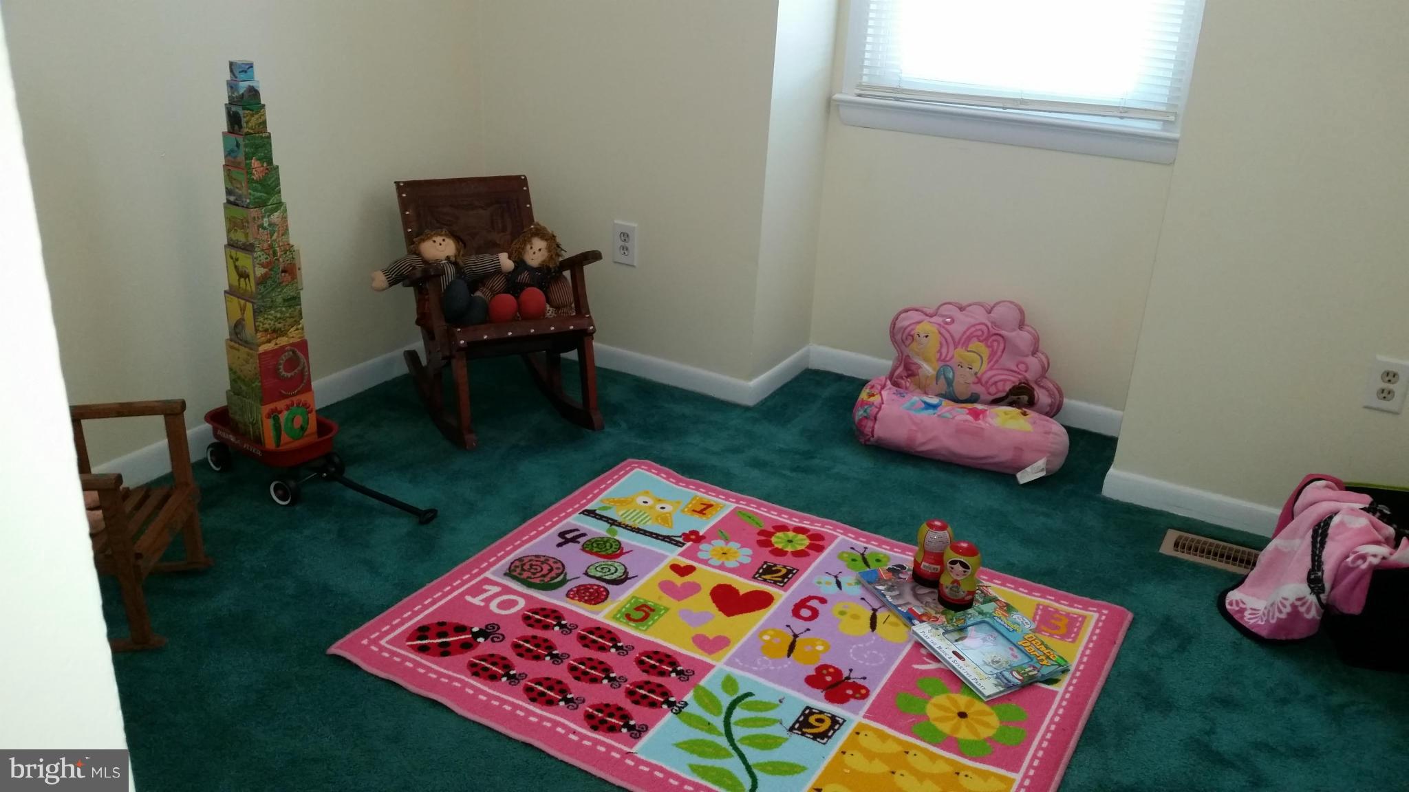7510 Saffron Court Hanover, MD 21076 - Photo 10 of 30 a bedroom with a bed table and a couch