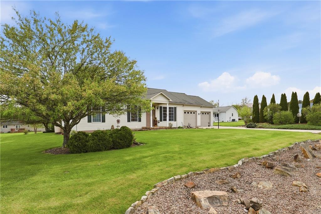 695 Greenhouse Road Rockwood, PA 15557 - Photo 2 of 50 a front view of a house with a garden