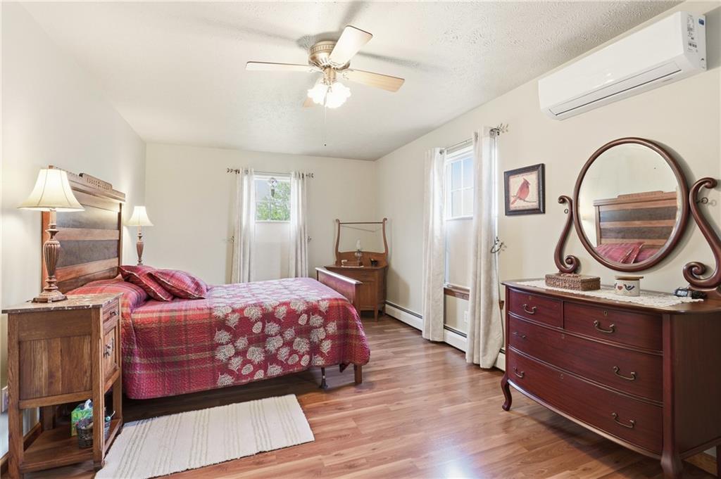 695 Greenhouse Road Rockwood, PA 15557 - Photo 23 of 50 a bedroom with a bed and a dresser