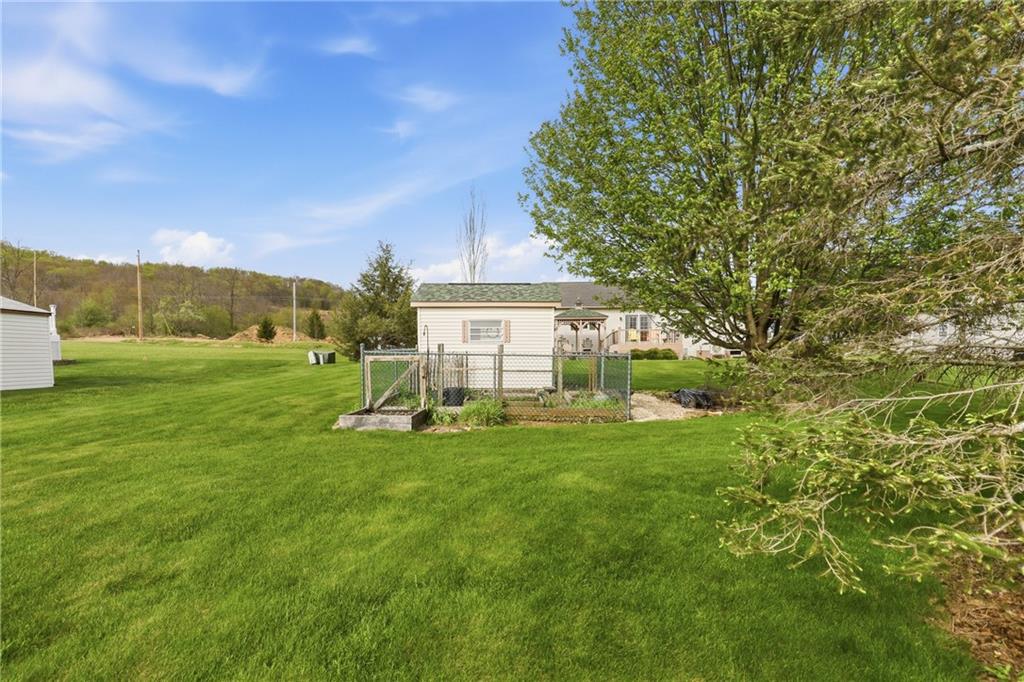695 Greenhouse Road Rockwood, PA 15557 - Photo 39 of 50 a view of a house with a yard