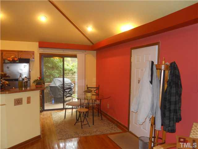 3507 Mill Run Raleigh, NC 27612 - Photo 6 of 16 a view of a dining room with furniture window and wooden floor