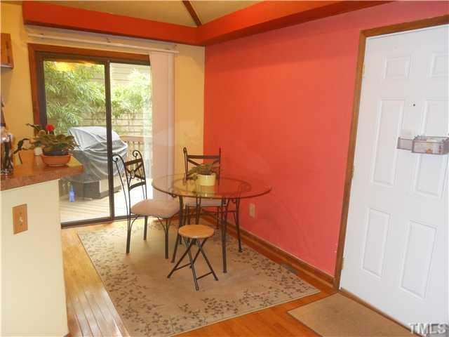 3507 Mill Run Raleigh, NC 27612 - Photo 7 of 16 a dining room with furniture and wooden floor