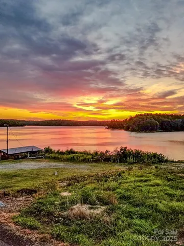 a view of a lake from a yard