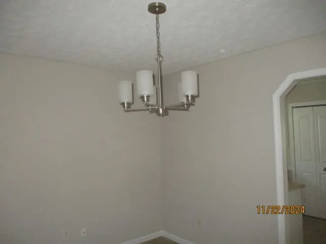 a view of a storage & utility room with sink