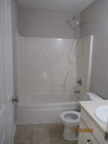 a bathroom with a bath tub and a shower