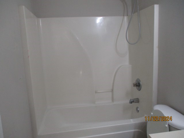 5712 Boby Drive Columbus, GA 31907 - Photo 22 of 27 a bathroom with a bath tub and a shower