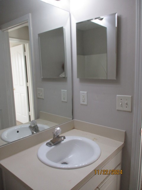 5712 Boby Drive Columbus, GA 31907 - Photo 23 of 27 a bathroom with a sink and a mirror