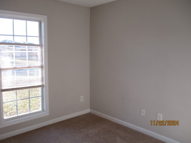 5712 Boby Drive Columbus, GA 31907 - Photo 26 of 27 an empty room with a window