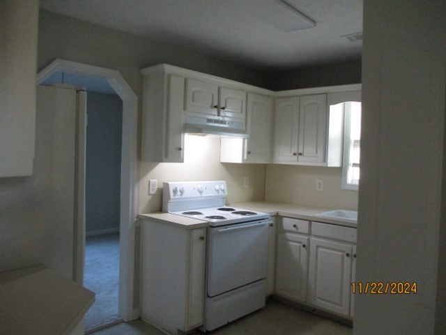 5712 Boby Drive Columbus, GA 31907 - Photo 6 of 27 a kitchen with cabinets appliances a sink and a window