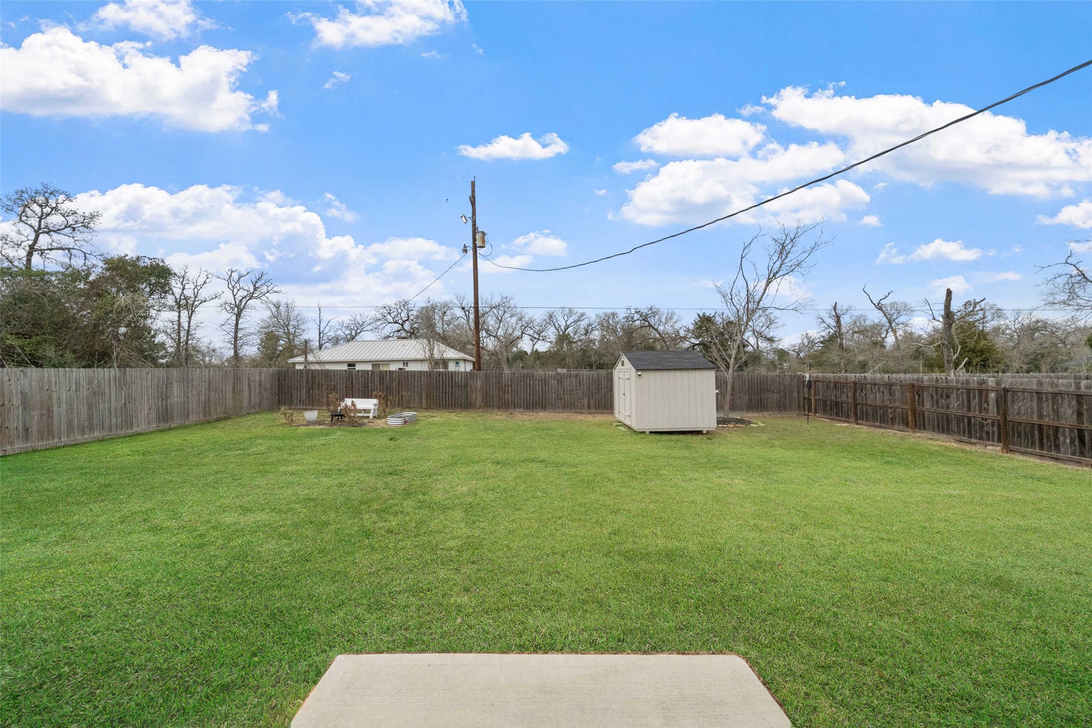 26431 Pin Oak Drive Hempstead, TX 77445 - Photo 23 of 31 a backyard of a house with lots of green space