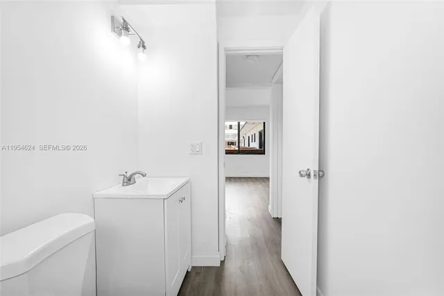 a en suite bathroom with a toilet sink