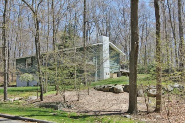 92 Gary Road Stamford, CT 06903 - Photo 1 of 1 a front view of a house with a yard