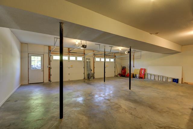 3456 Lake Road Woodlawn, TN 37191 - Photo 15 of 20 What a garage! electric opener,extra deep ,built in shelving and cabinets as well