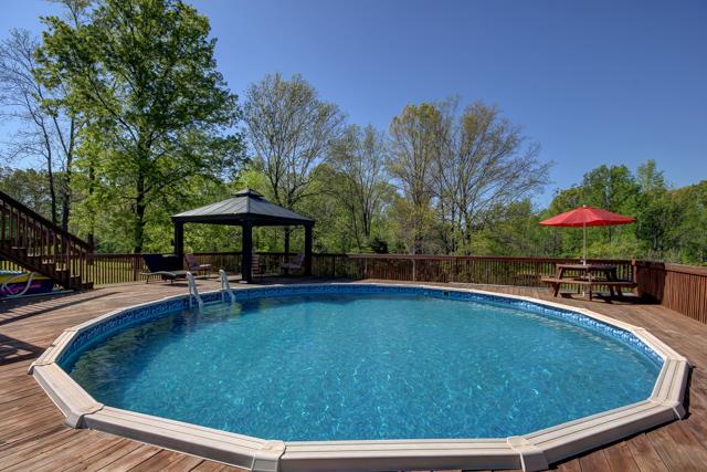 3456 Lake Road Woodlawn, TN 37191 - Photo 17 of 20 Awesome entertainment area with gazebo and plenty of room for seating and tables