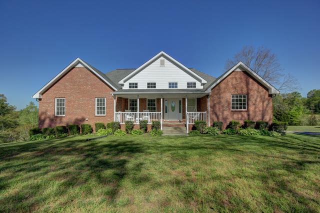 3456 Lake Road Woodlawn, TN 37191 - Photo 20 of 20 Beautiful landscaped front-Welcome home!