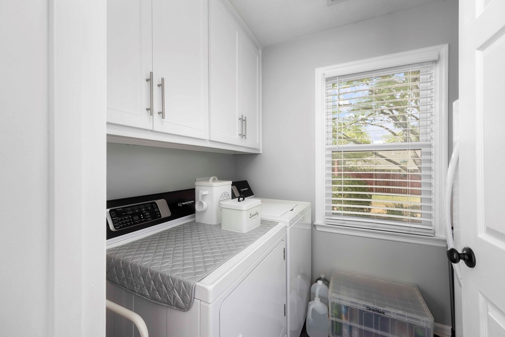 5017 Emerald Isle Court Columbus, GA 31909 - Photo 13 of 37 a kitchen with a window a sink and a cabinets