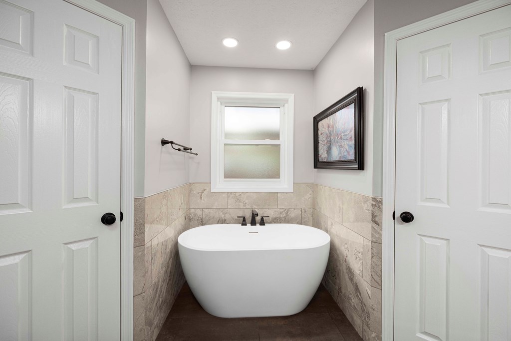 5017 Emerald Isle Court Columbus, GA 31909 - Photo 18 of 37 a bathroom with a sink and a mirror