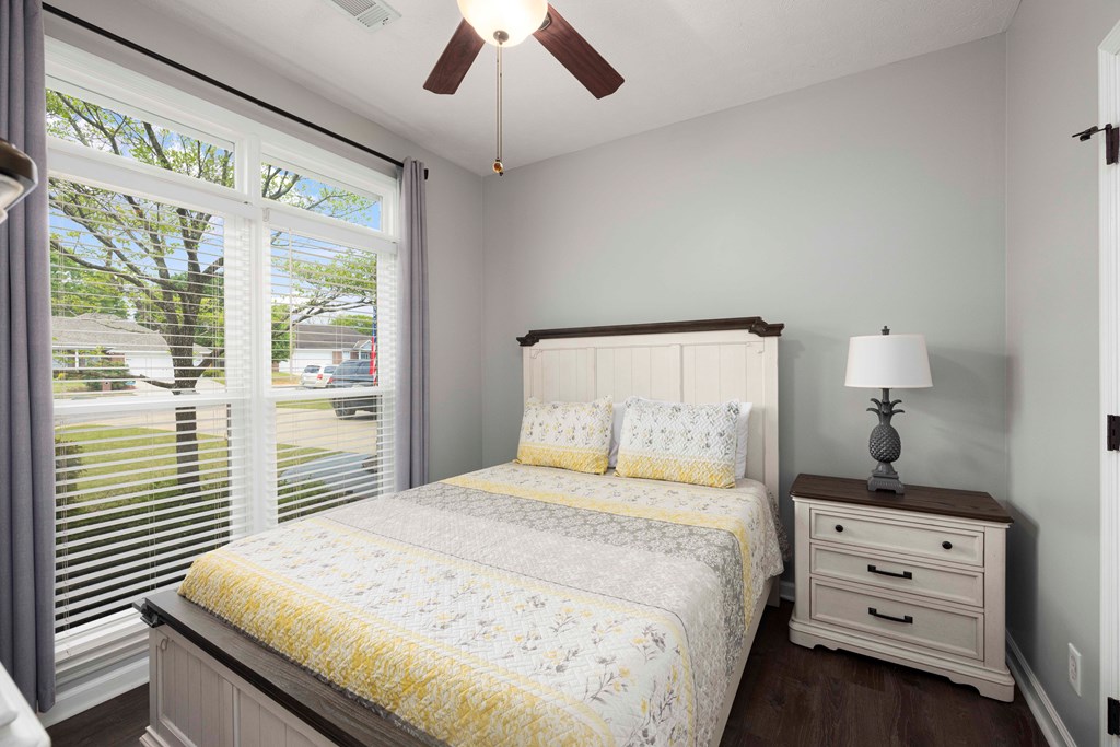 5017 Emerald Isle Court Columbus, GA 31909 - Photo 24 of 37 a bedroom with a bed and a large window