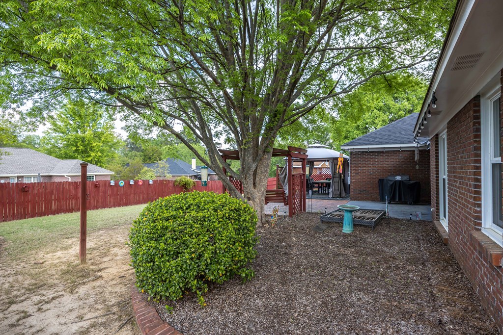 5017 Emerald Isle Court Columbus, GA 31909 - Photo 34 of 37 a backyard of a house with seating space