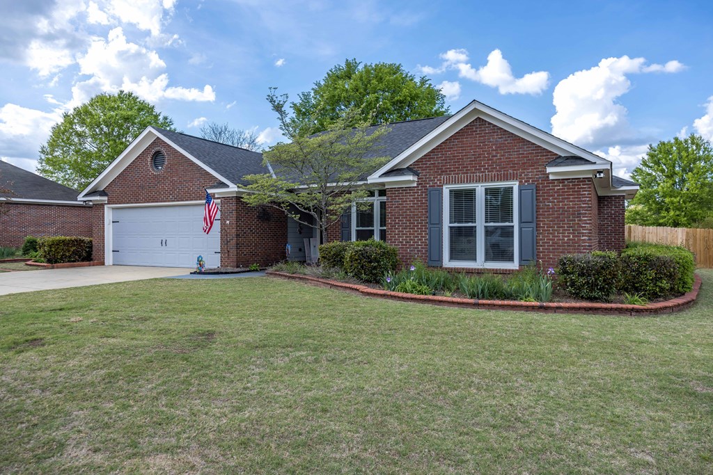5017 Emerald Isle Court Columbus, GA 31909 - Photo 36 of 37 a front view of a house with a yard and garage