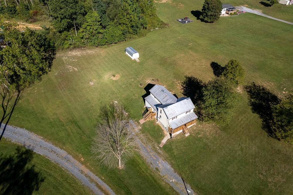396 Lick Run Road Mount Solon, VA 22843 - Photo 32 of 35 an aerial view of a house with a yard basket ball court and outdoor seating