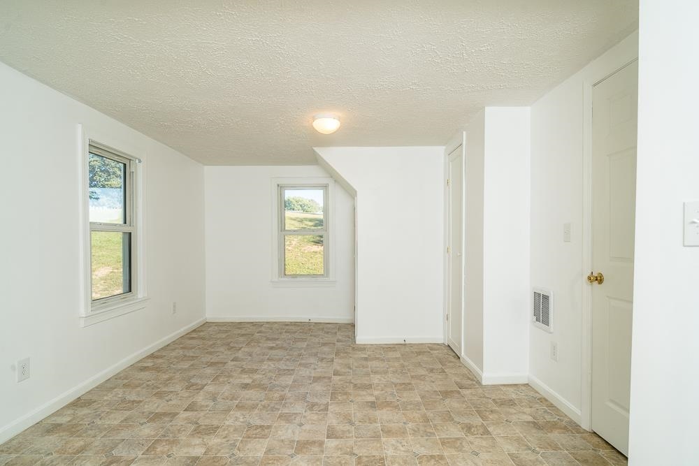 396 Lick Run Road Mount Solon, VA 22843 - Photo 7 of 35 a view of an empty room and window