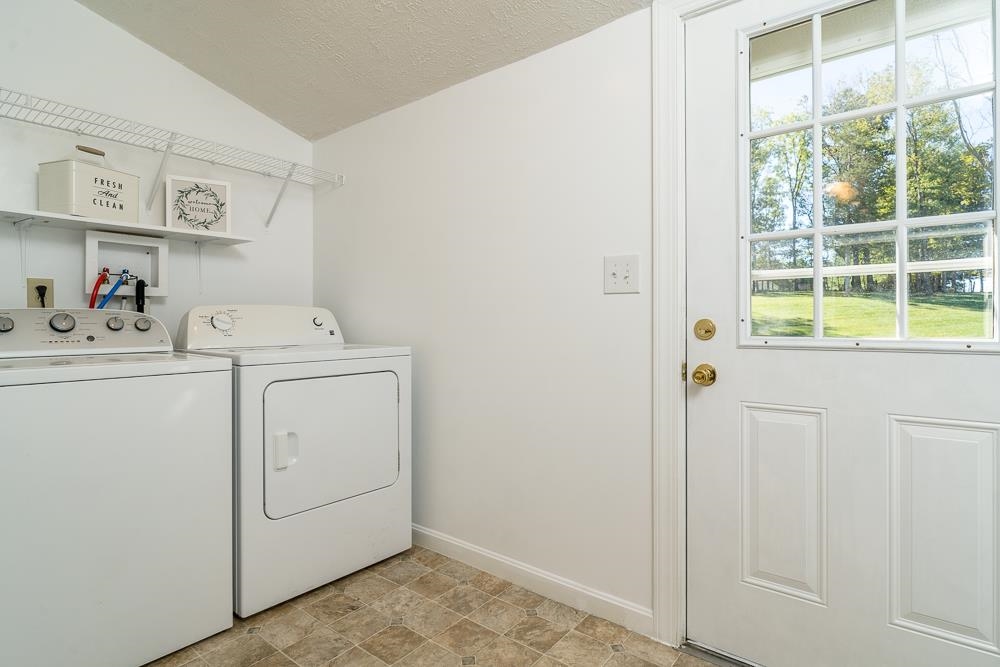 396 Lick Run Road Mount Solon, VA 22843 - Photo 9 of 35 a utility room with dryer and washer