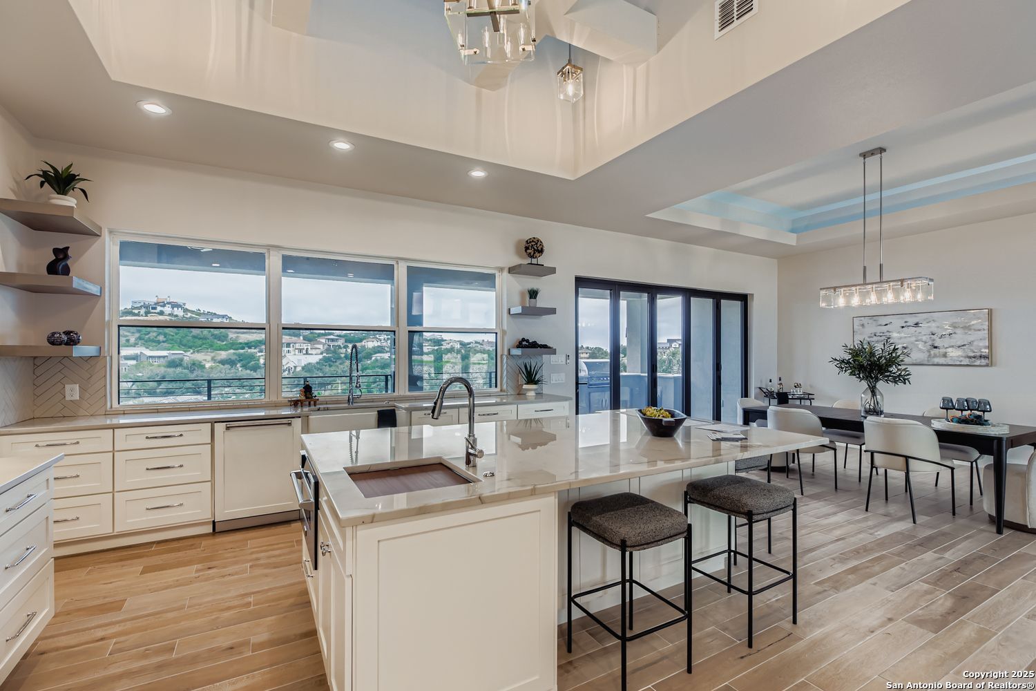 23202 Walker Ridge San Antonio, TX 78255 - Photo 12 of 44 a very nice looking living room with a large window and wooden floors
