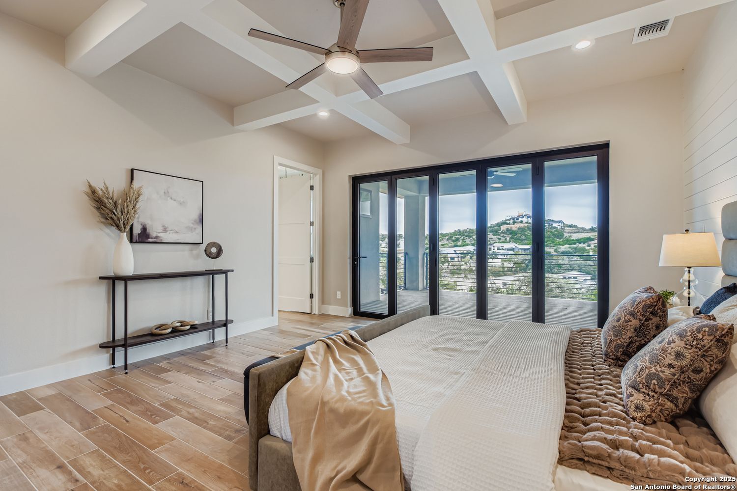 23202 Walker Ridge San Antonio, TX 78255 - Photo 19 of 44 a bedroom with a bed and a large window