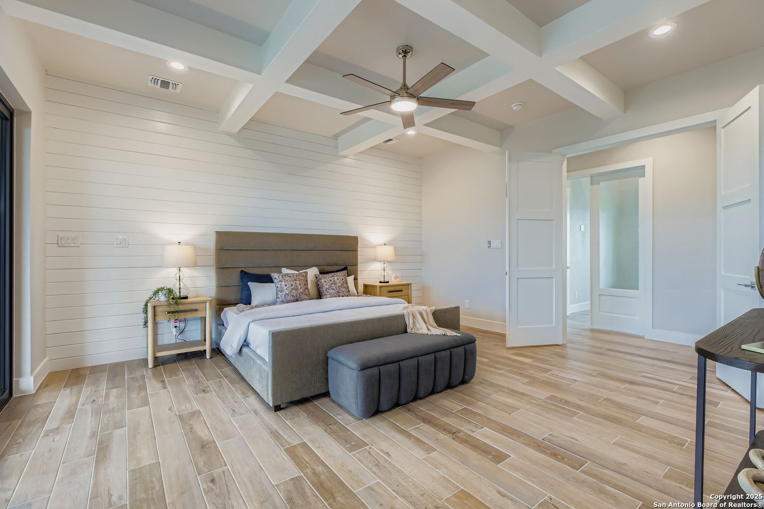 23202 Walker Ridge San Antonio, TX 78255 - Photo 20 of 44 a bed room with a bed and a ceiling fan