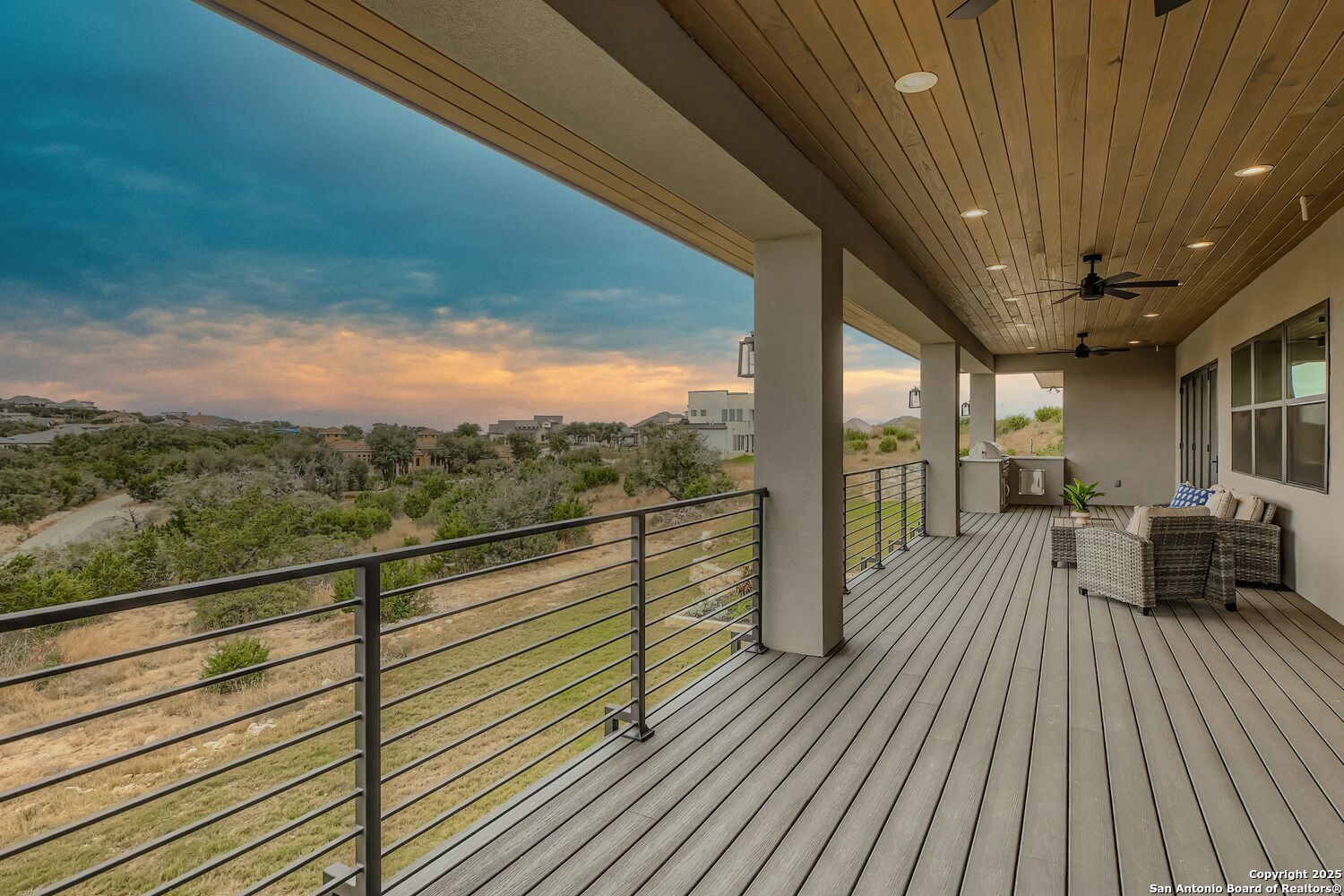 23202 Walker Ridge San Antonio, TX 78255 - Photo 34 of 44 a view of a balcony with wooden floor